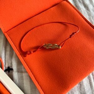 John Hardy love knot mini cord 14k gold bracelet in size SMALL.